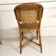 Set of 4 antique chairs in woven red and natural rattan.