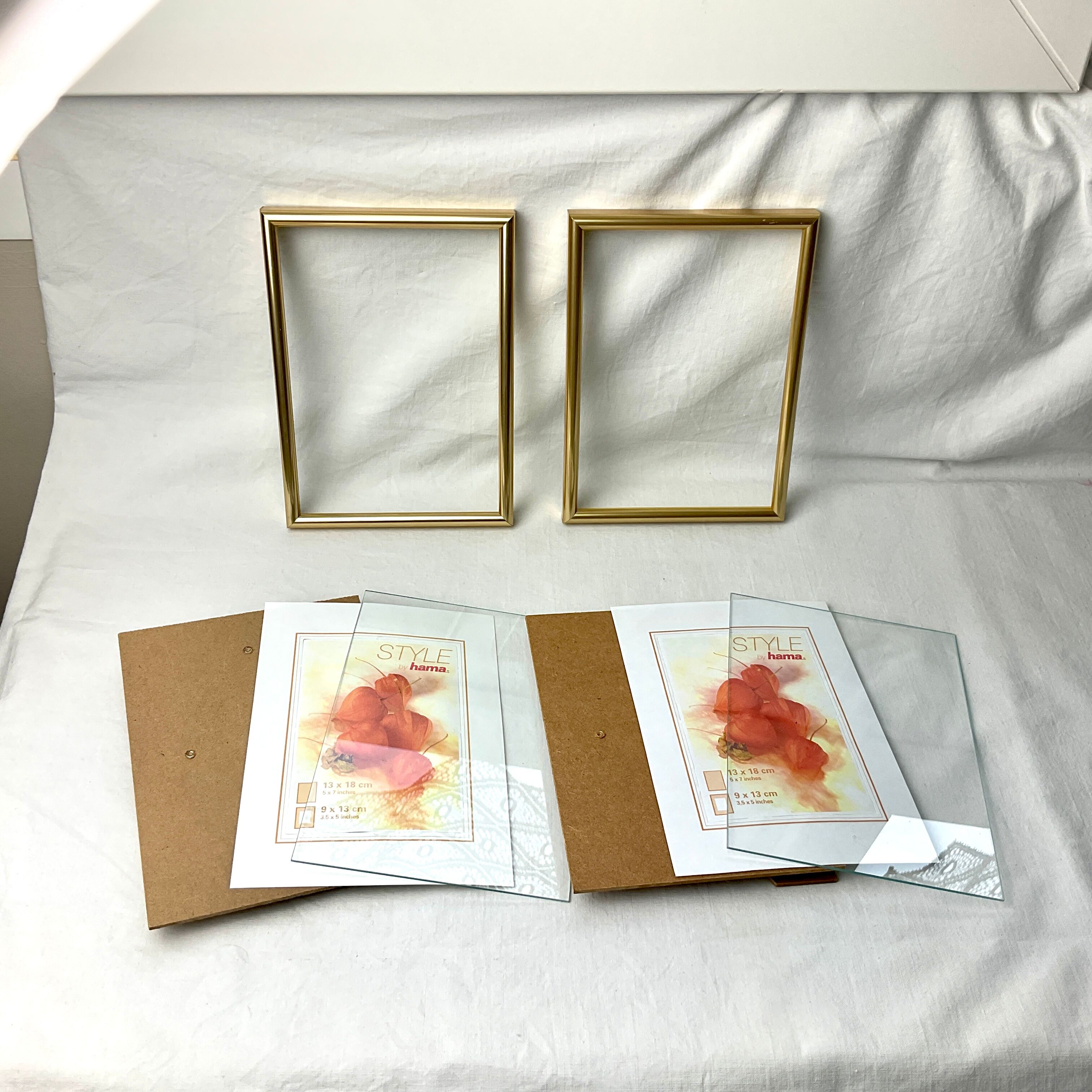 Pair of golden frames. Hama