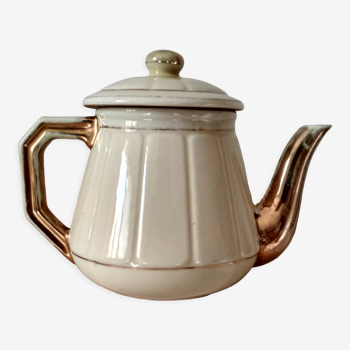 Teapot in yellow and gold earthenware