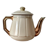 Théière en faïence jaune et or