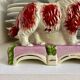Pair of Staffordshire porcelain Cavalier King Charles dogs on terrace, 19th century.