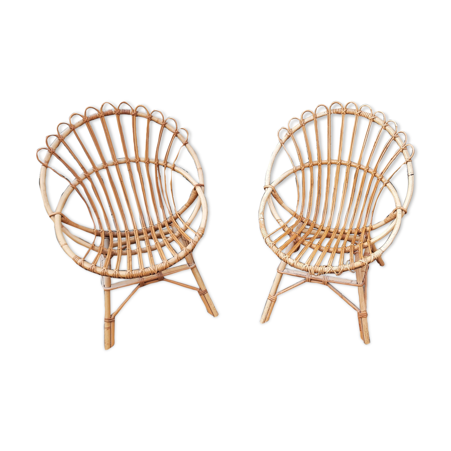Pairs of shell rattan armchairs from the 50
