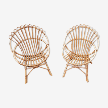 Pairs of shell rattan armchairs from the 50