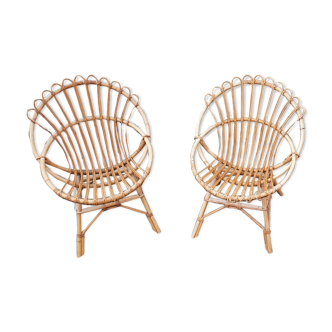 Pairs of shell rattan armchairs from the 50