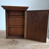 Key holder in wood and brass flower illustration