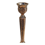 Pair of chiseled metal candle holders