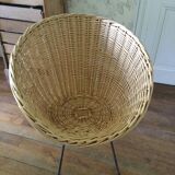 Antique round rattan armchair