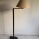 Floor lamp with articulated arm