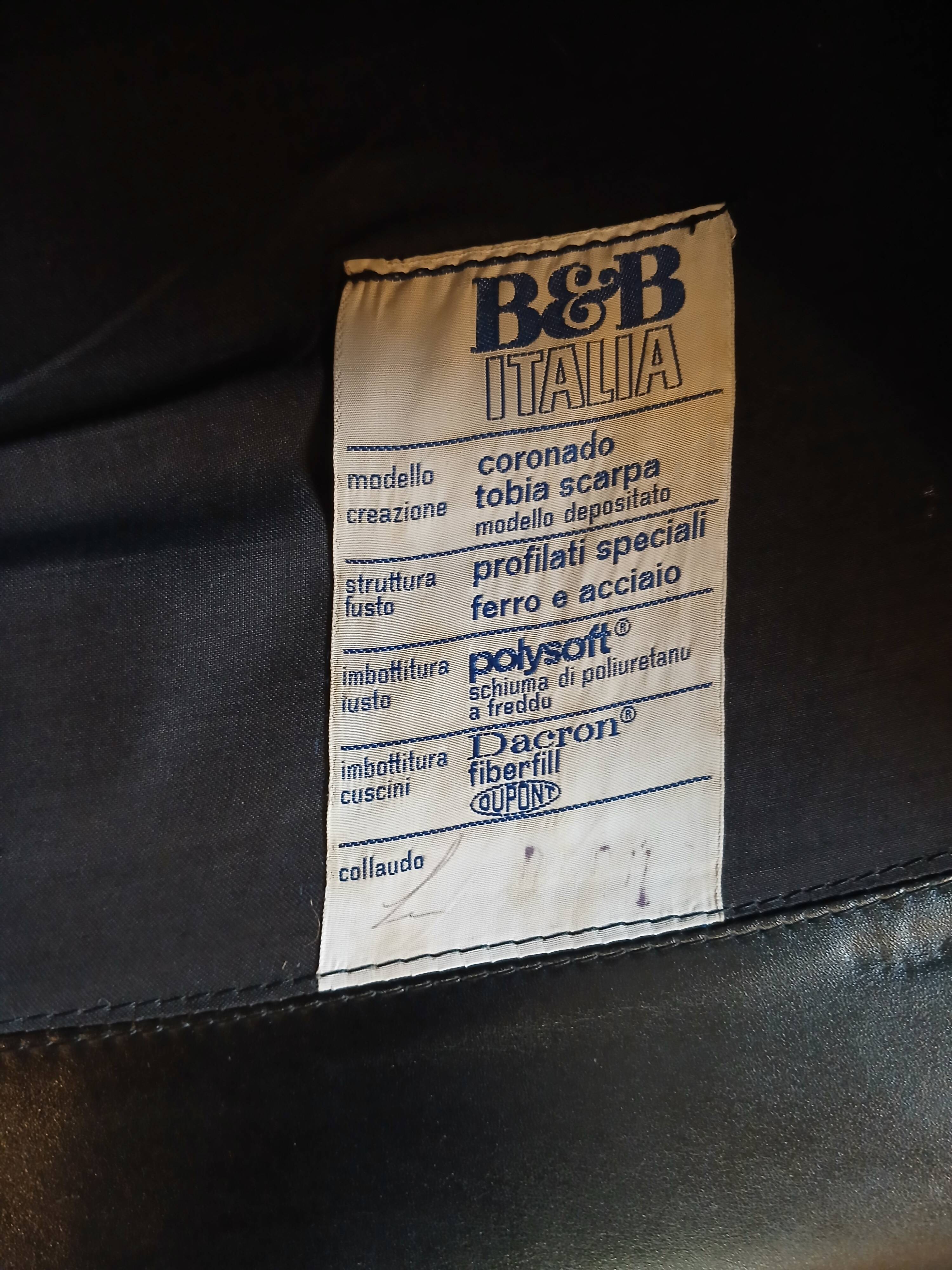 Pair of designer leather armchairs by Tobia Scarpa