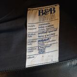 Pair of designer leather armchairs by Tobia Scarpa