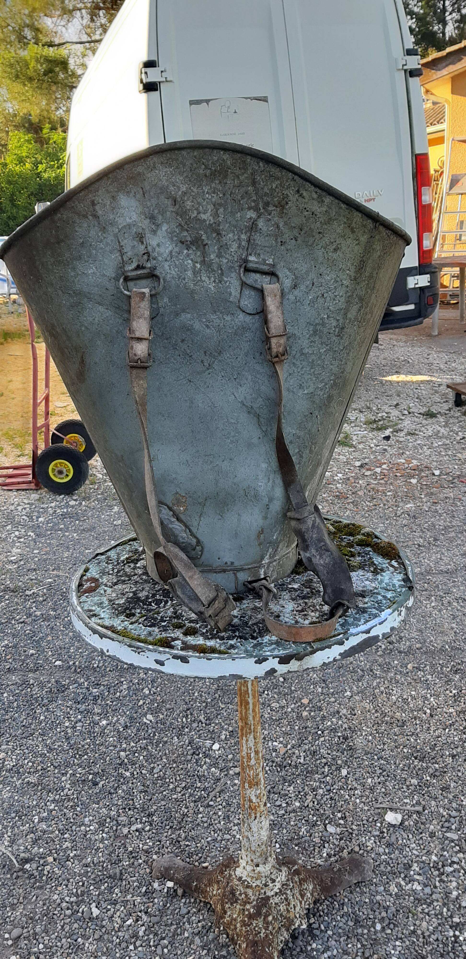 Galvanized metal and leather harvest hood