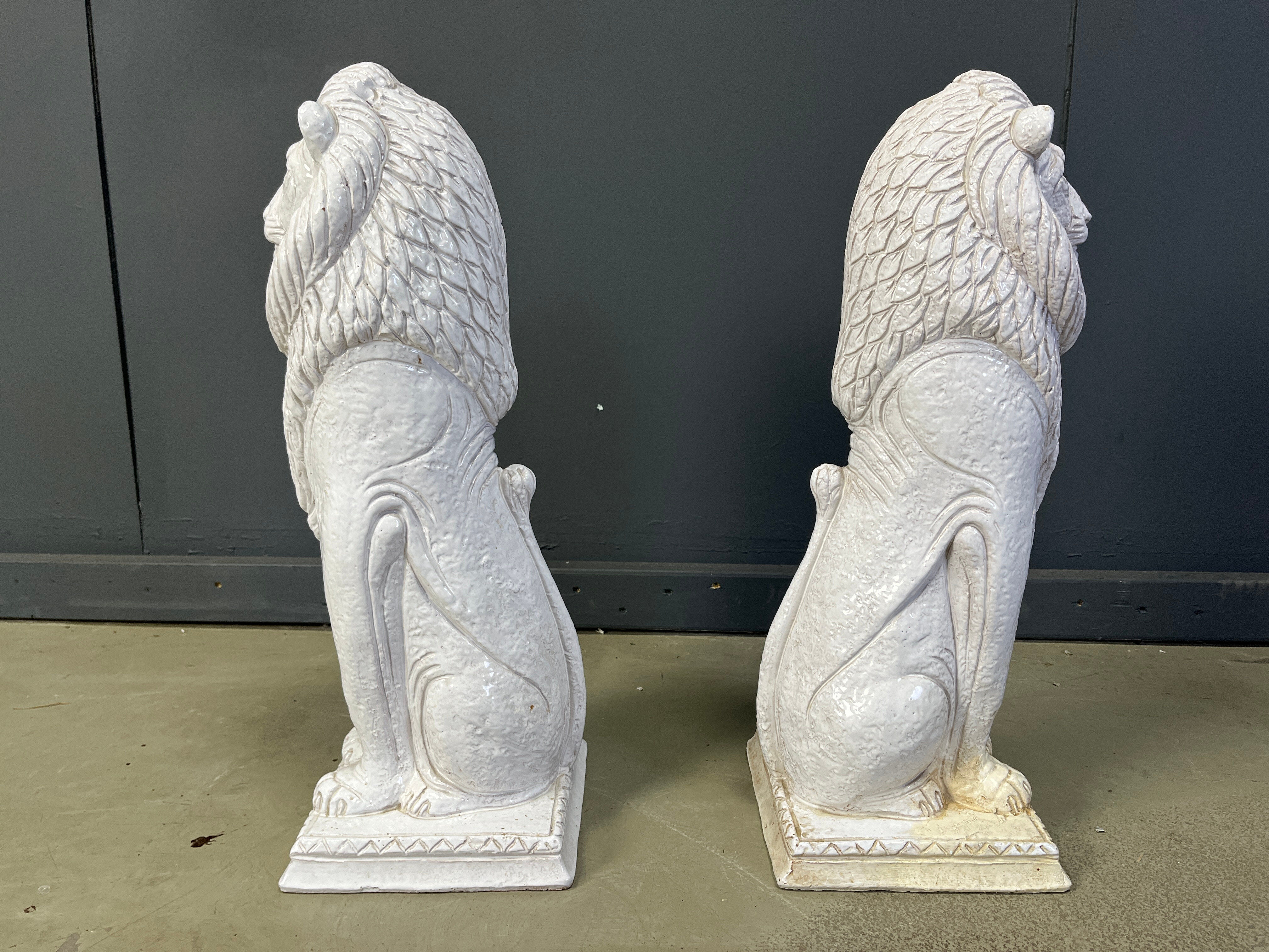 Pair of Renaissance style terracotta lion sculptures, 1950s