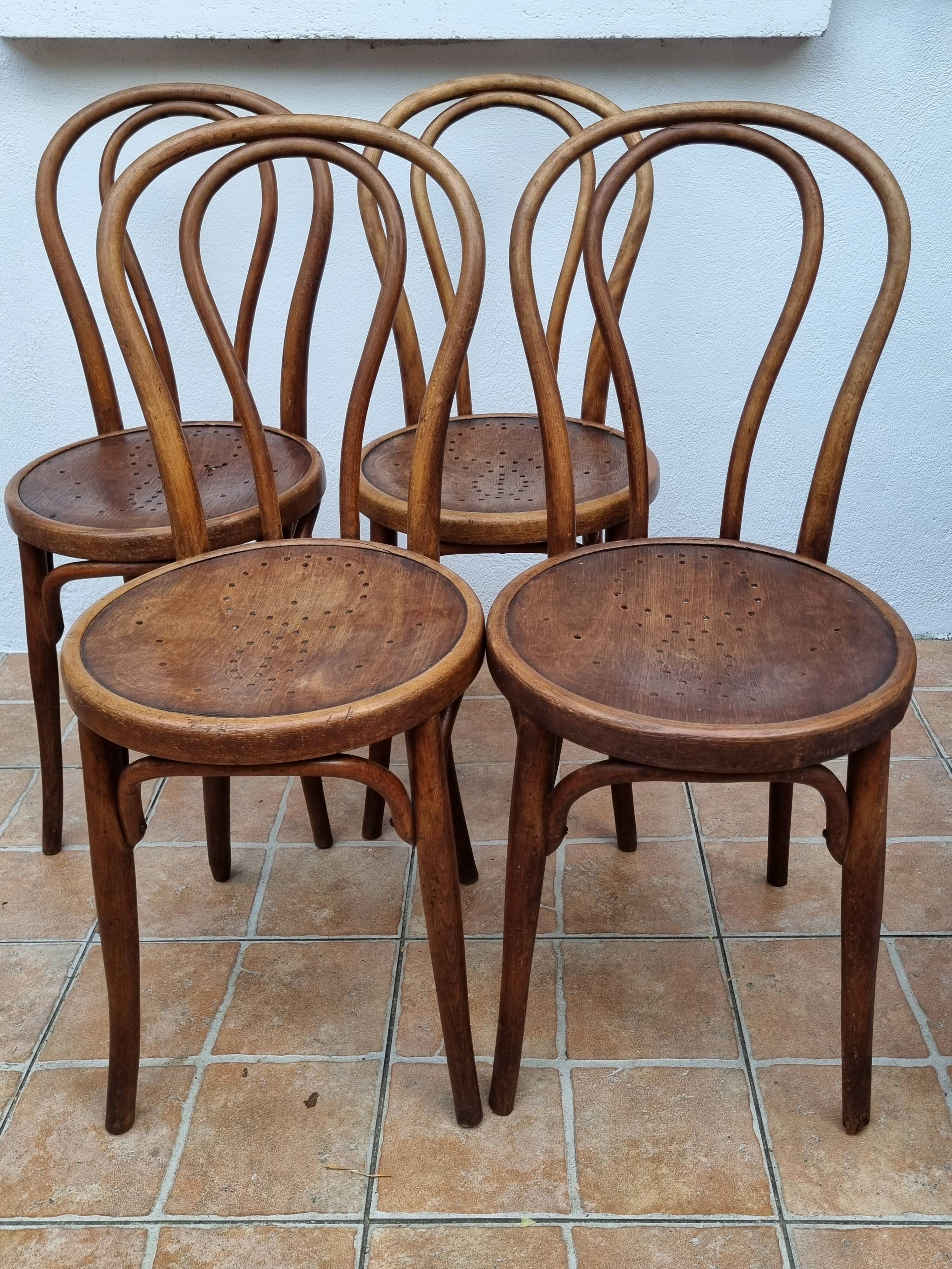 Set of 4 bentwood bistro chairs, stamped "Jacob & Josef Kohn", late 19th century