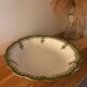 Green Limoges porcelain serving dish with gilt trim