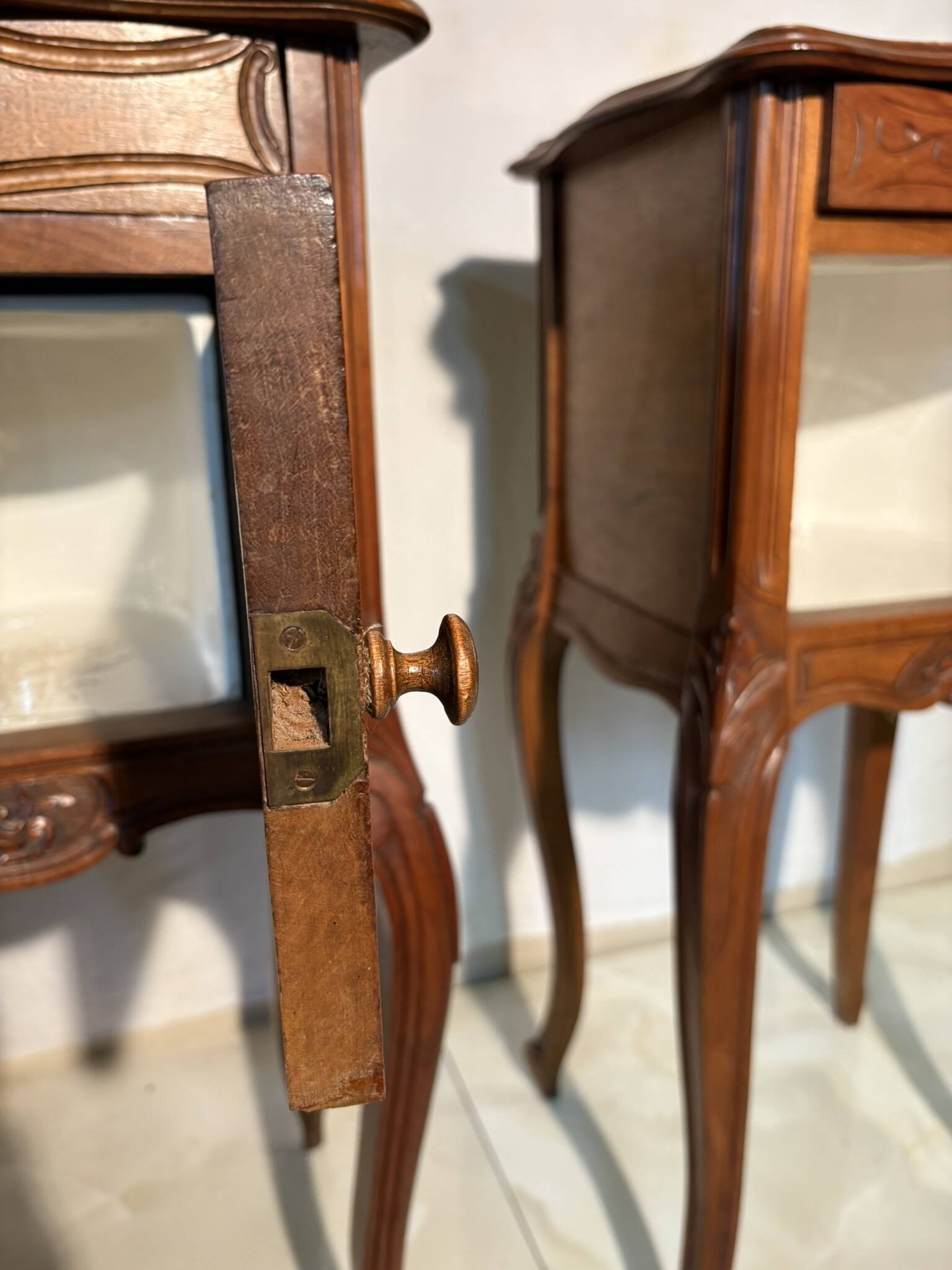 Pair of antique bedside tables with marble top and ceramic niche