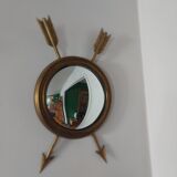 Curved brass witch's mirror