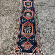 Vintage Anatolian runner rug in wool from the 1950s.