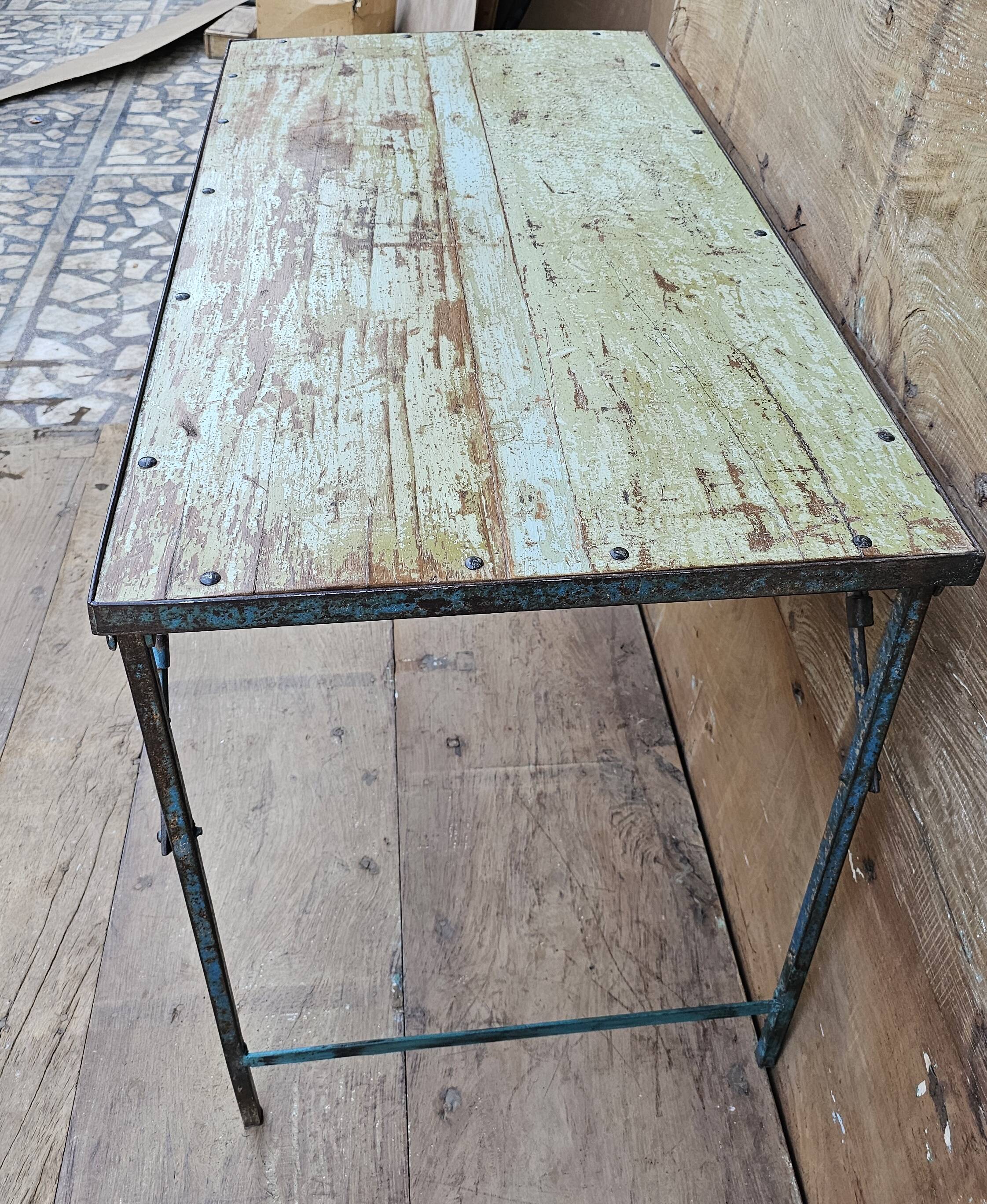 Old folding table in Burmese teak and steel