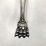 Set of three silver metal service cutlery