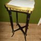Napoleon III side table with marble top and openwork gallery.