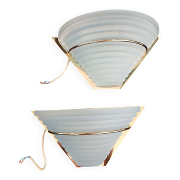 Art Deco wall lights in glass and gilded metal.