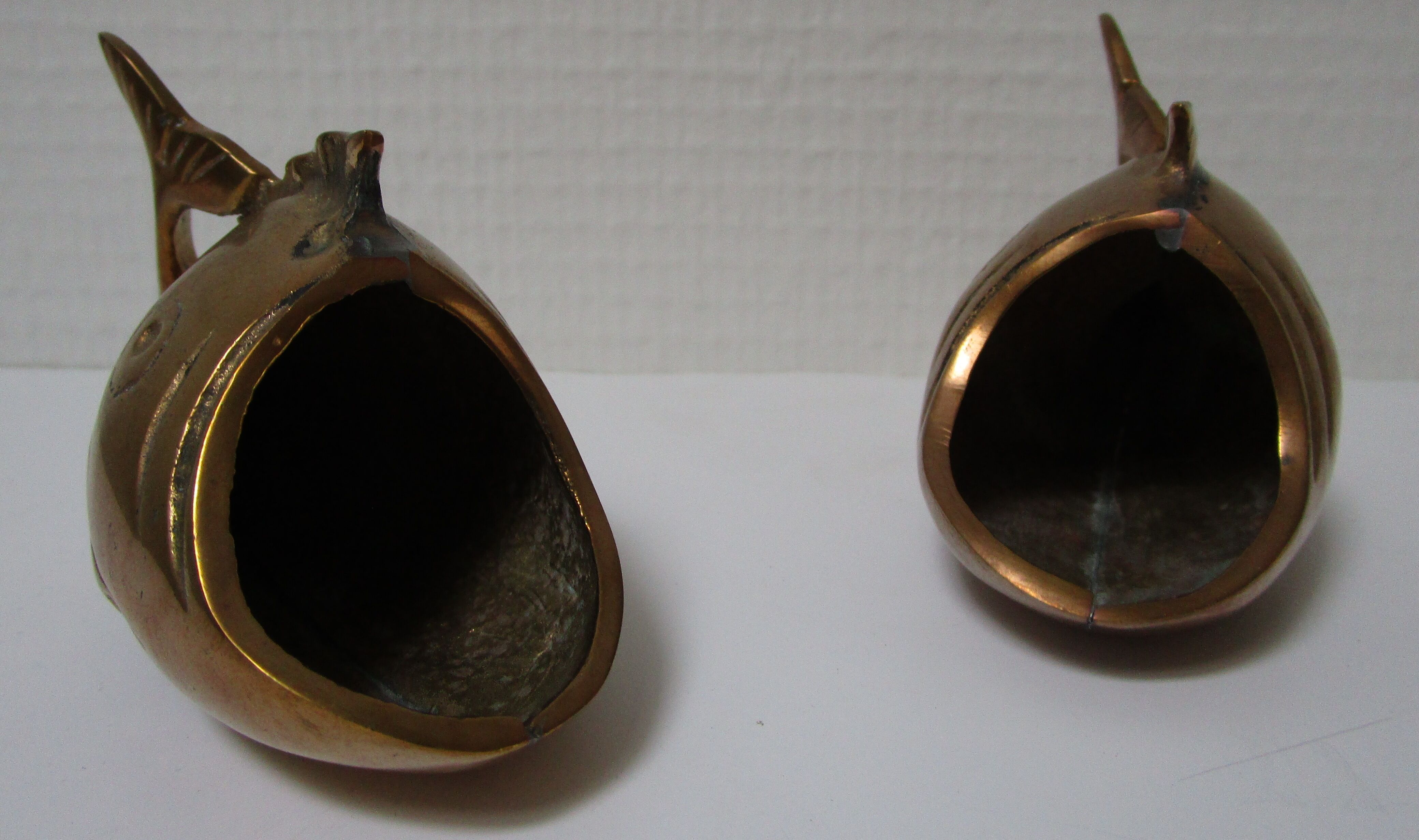 Two vintage brass fish ashtrays