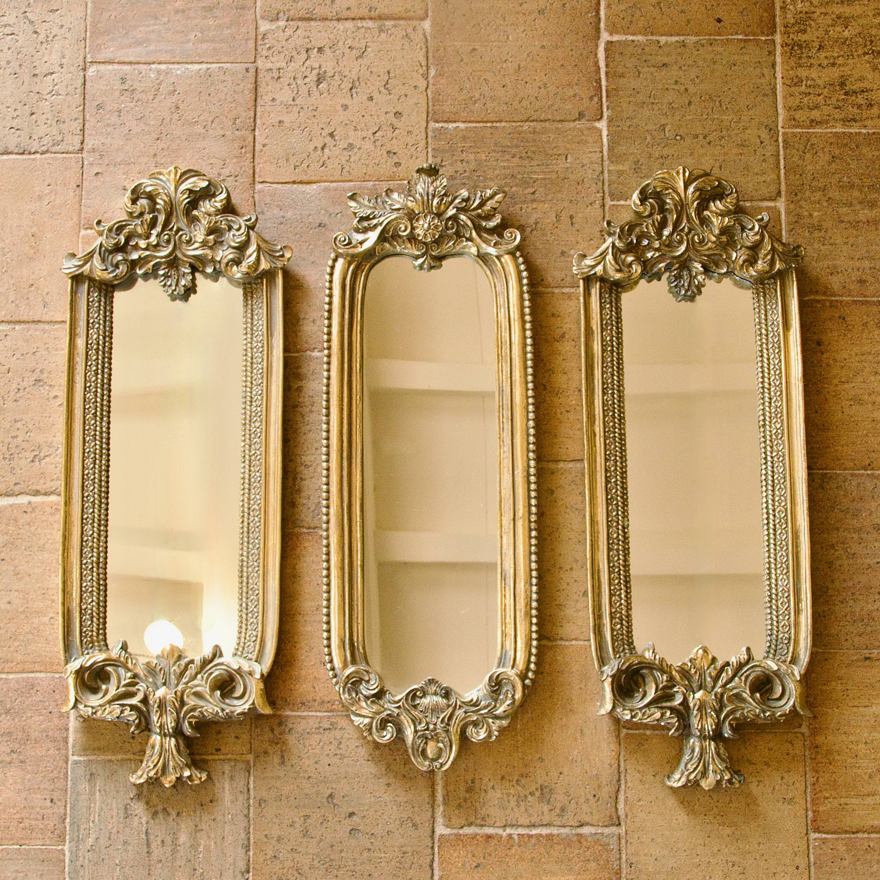 Triptych of gilded mirrors, 19th century, baroque rococo.