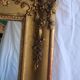 Antique Louis Philippe style gilded mirror decorated with floral motifs