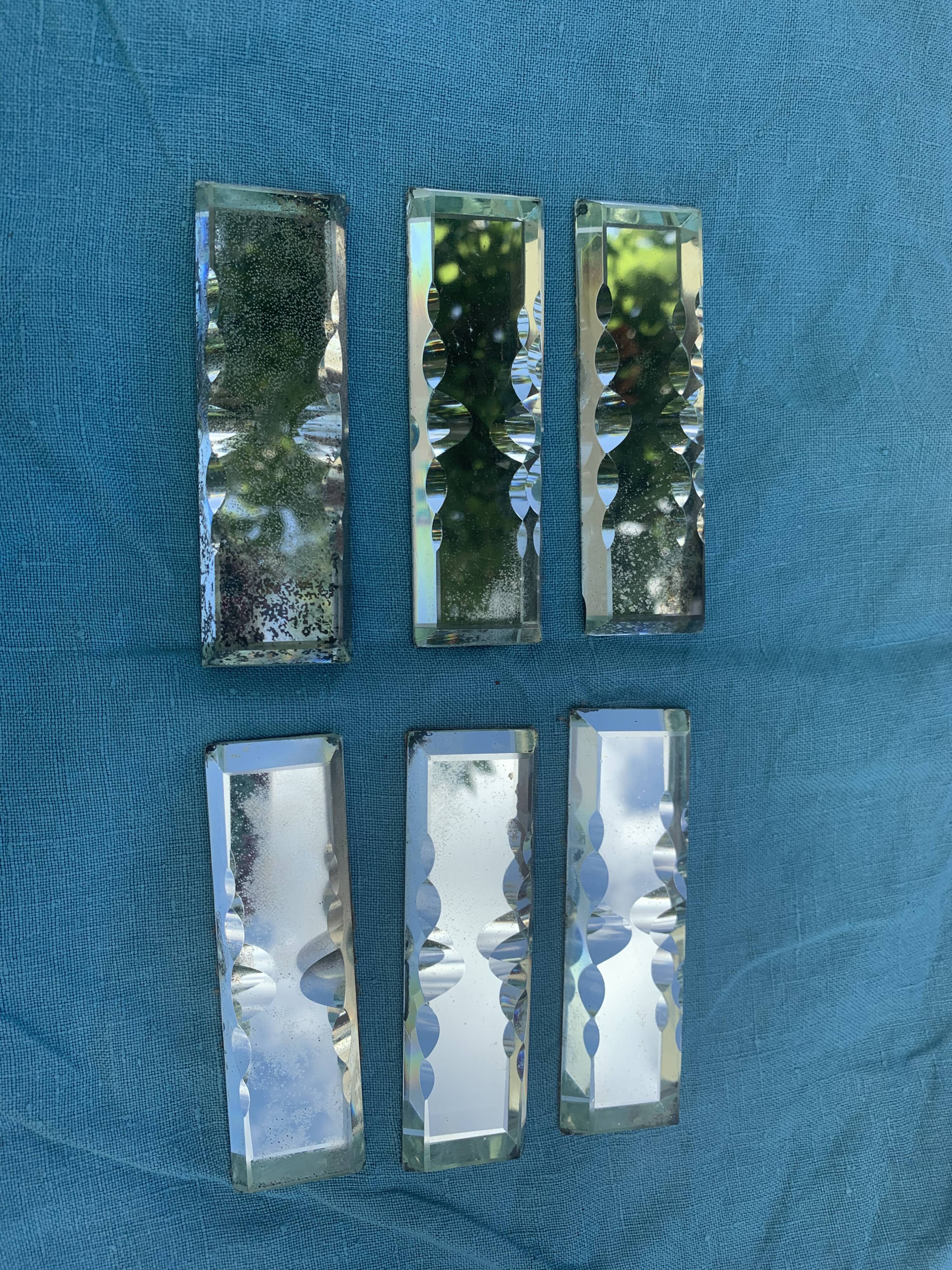 6 knife holders and a bottle bottom, glass, beveled mirror