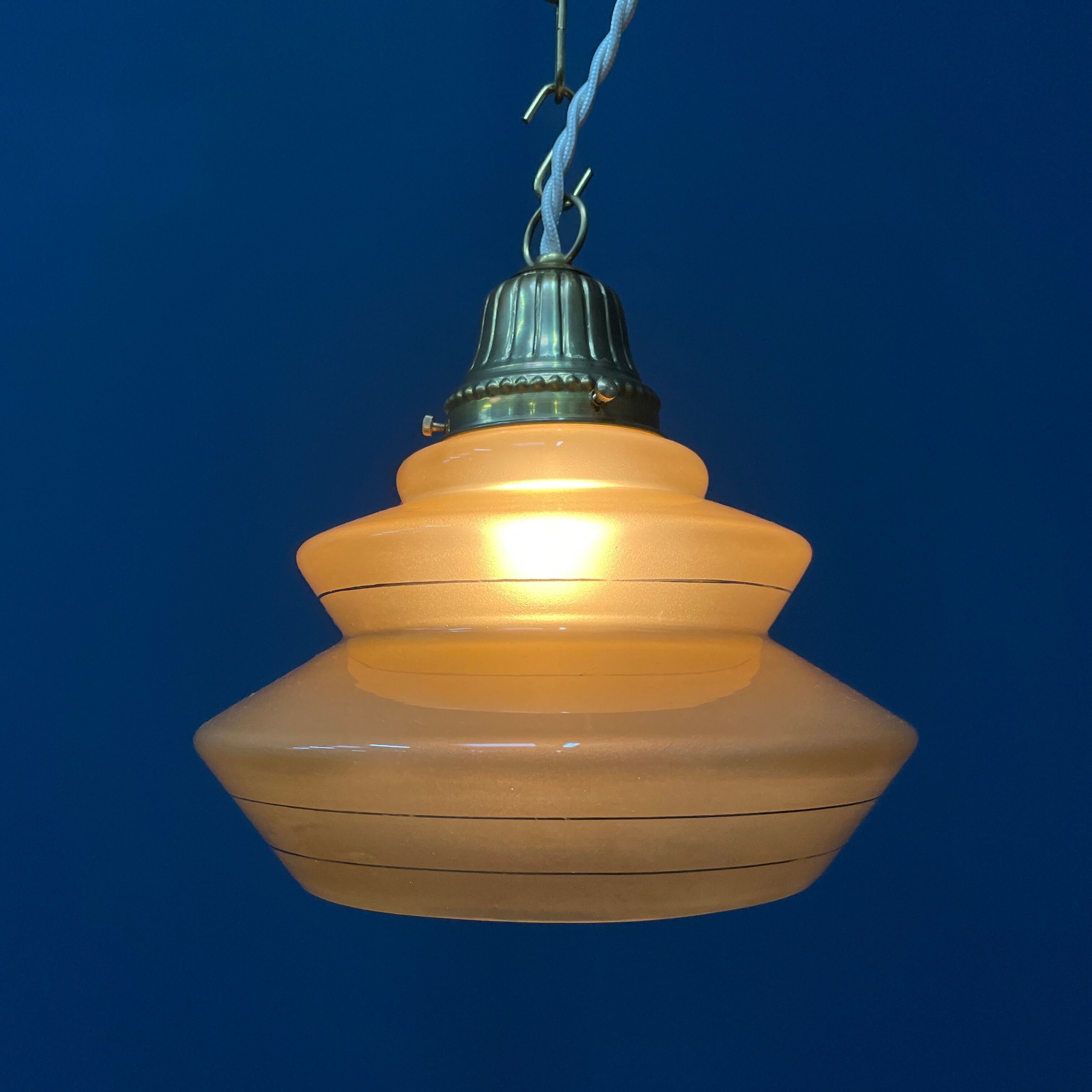 Vintage ocher glass hanging lamps with brass gallery