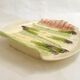 Mid-century asparagus dish, in Keller & Guérin barbotine earthenware.