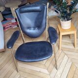 Black and golden bronze designer armchair