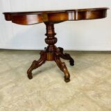 Violin-shaped pedestal table