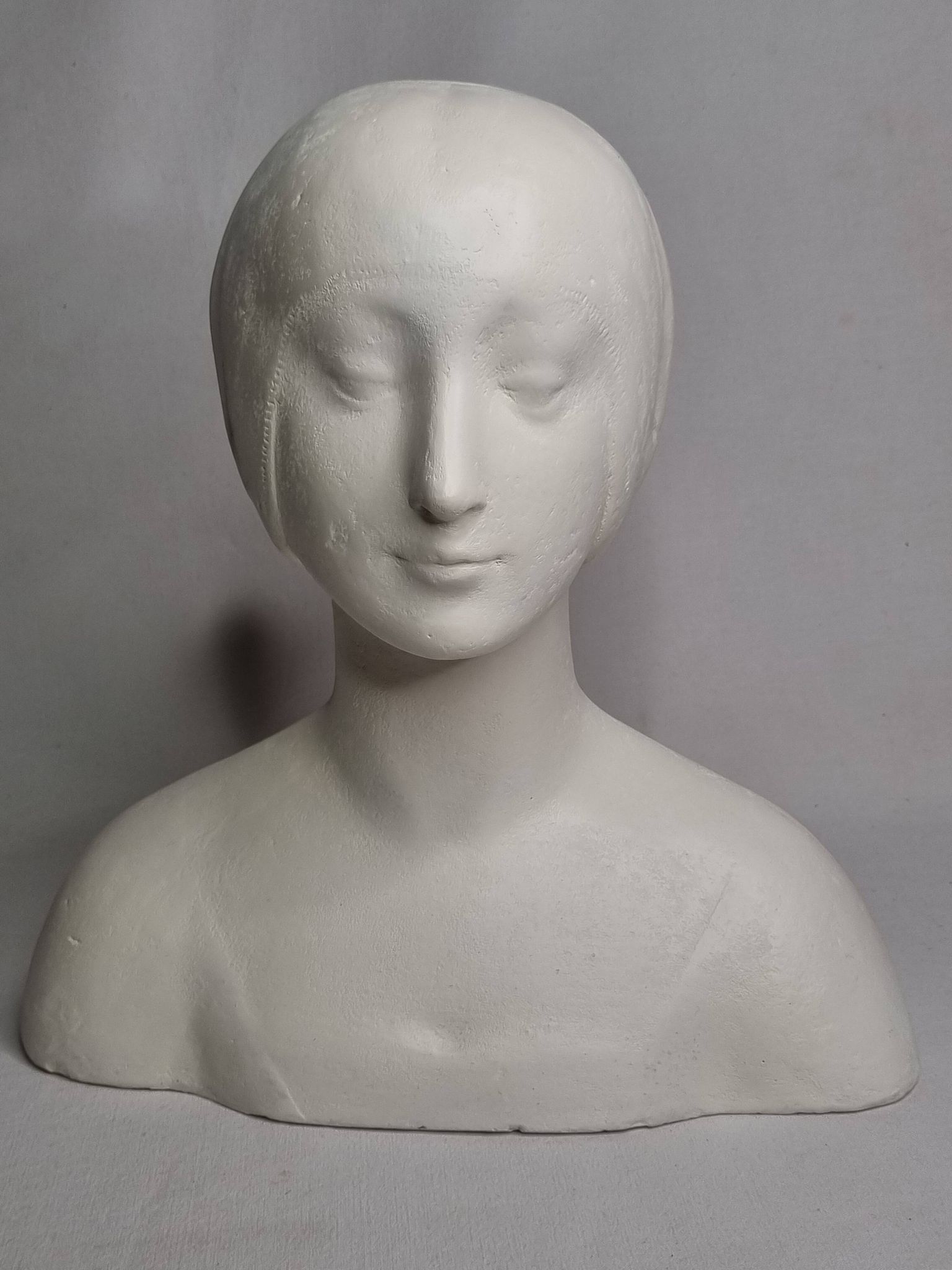 Bust after Laurana in Renaissance style, known as Aragon, patinated plaster, 33 cm.