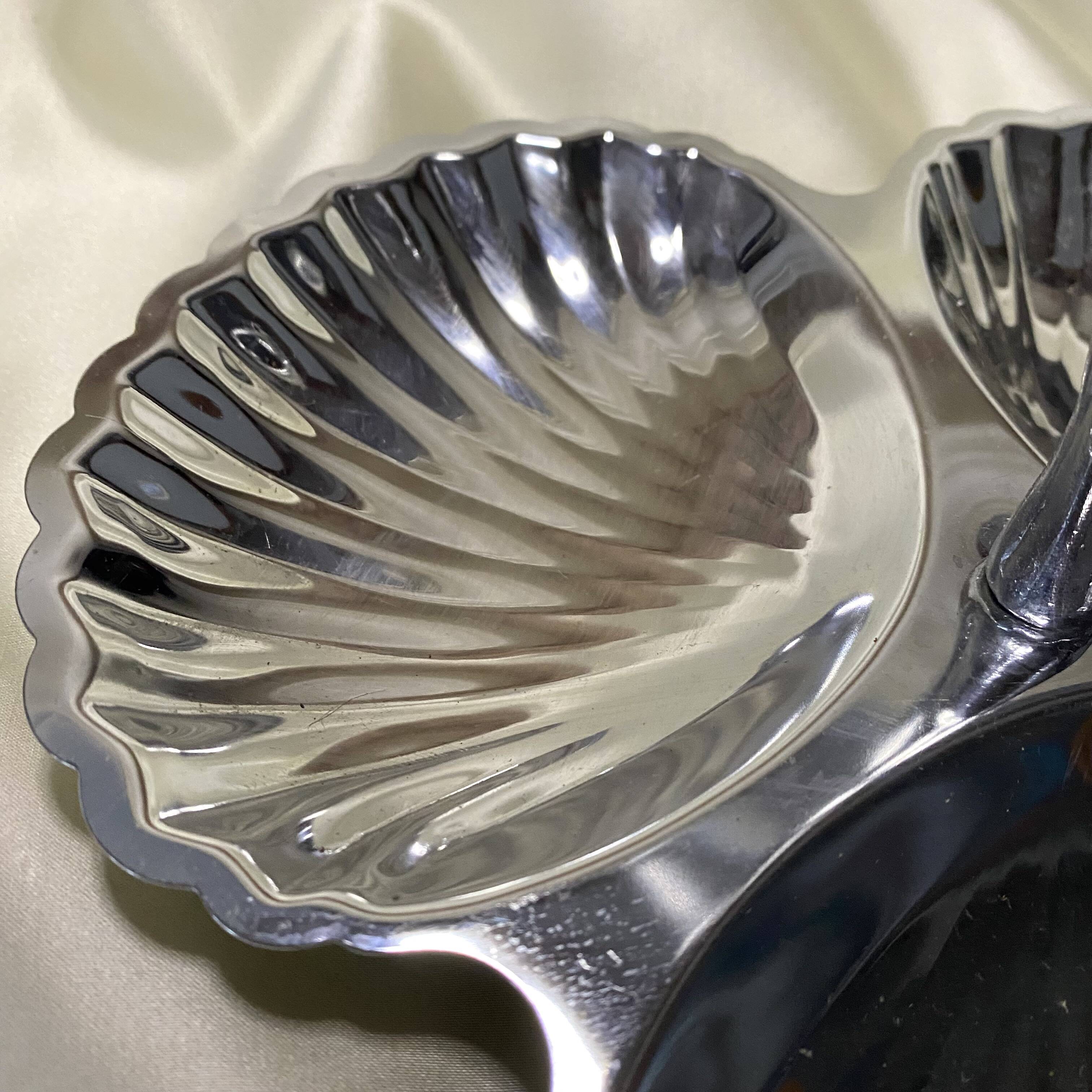 Stainless steel serving platter in the shape of seashells