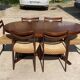 Baumann round oval extendable Scandinavian table in rosewood with 2 extensions.