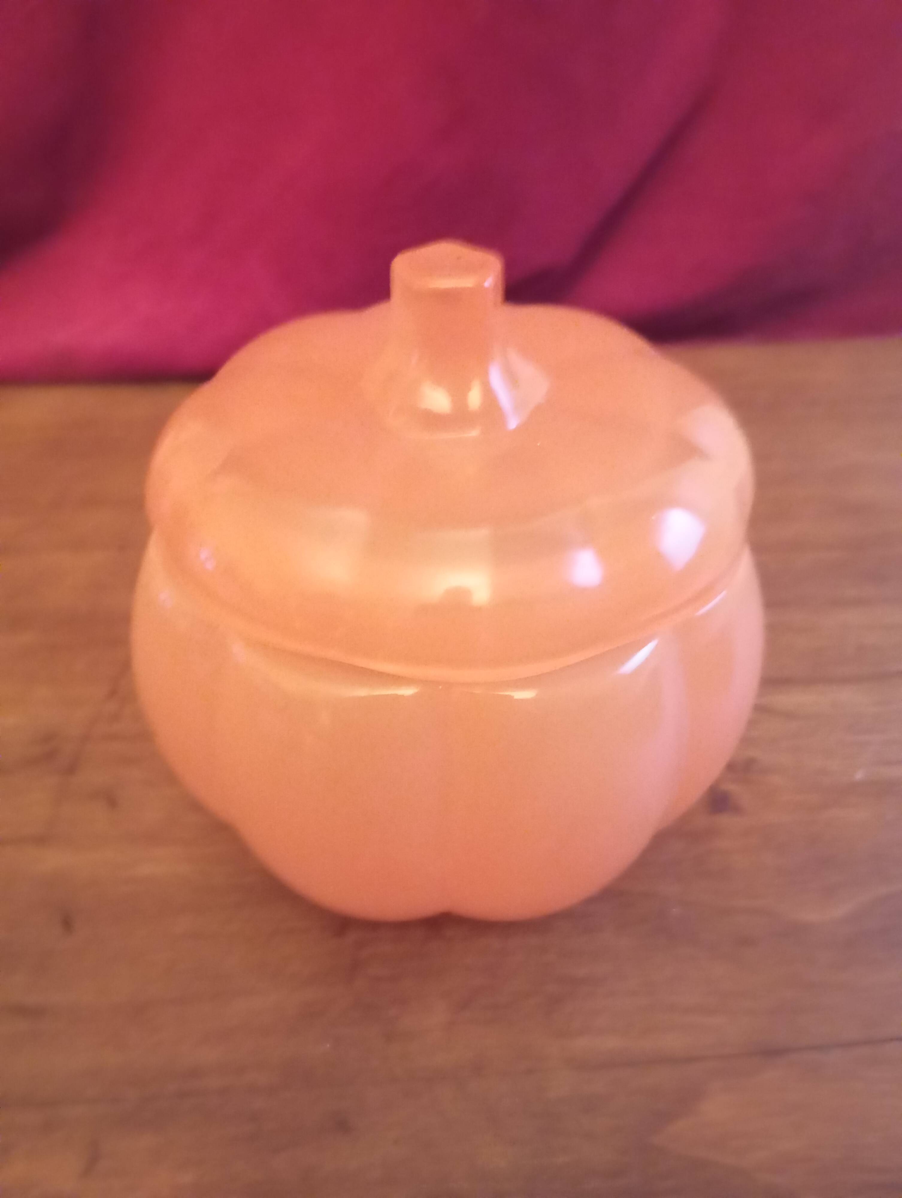 Candy box or glass sugar bowl in orange pumpkin shape