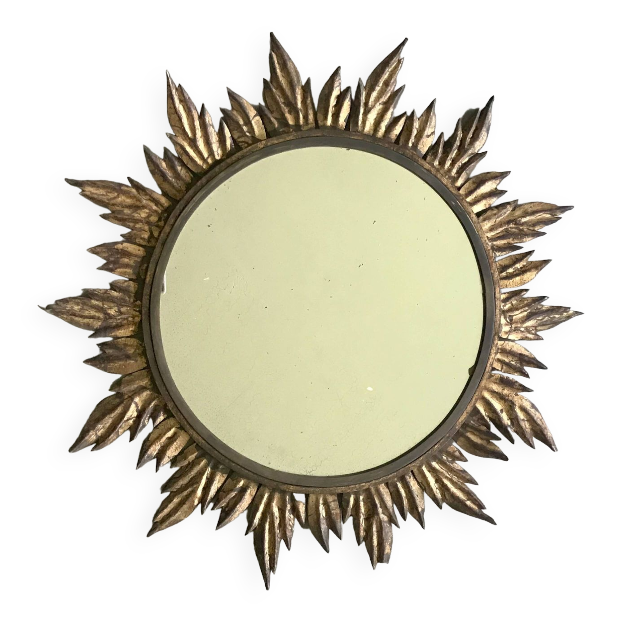 Sun mirror decorated with golden leaves, circa 1950.