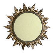 Sun mirror decorated with golden leaves, circa 1950.