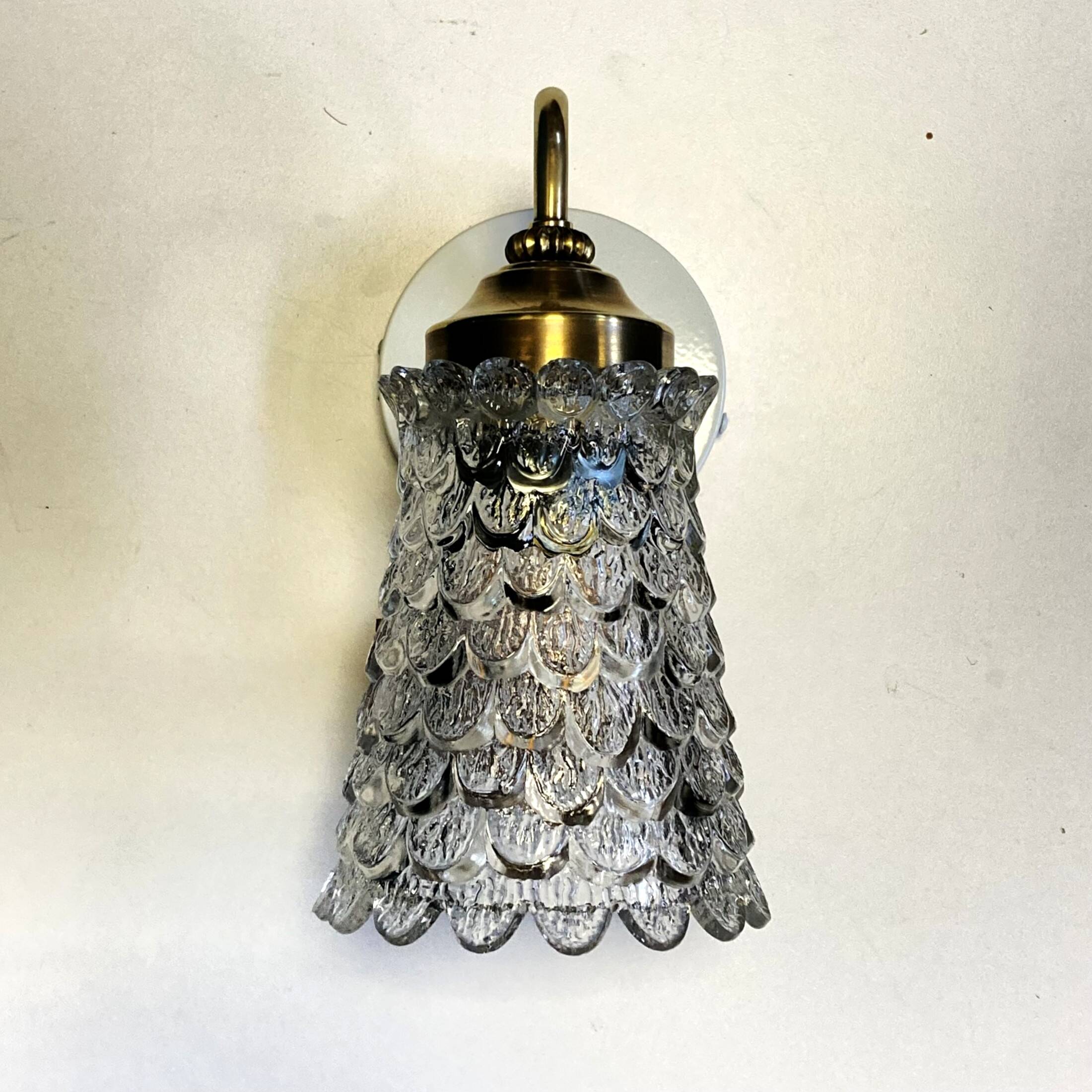 Old brass swan neck wall light and transparent glass tulip vintage decoration