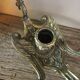 Brass candle holder cave rat peacock