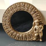 Shabby Chic round mirror. Putti/Cherub decor. Floral motifs. Dimensions: 20 x 20 cm.