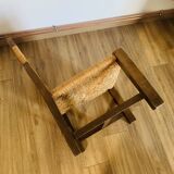 Pair of low wooden and straw armchairs