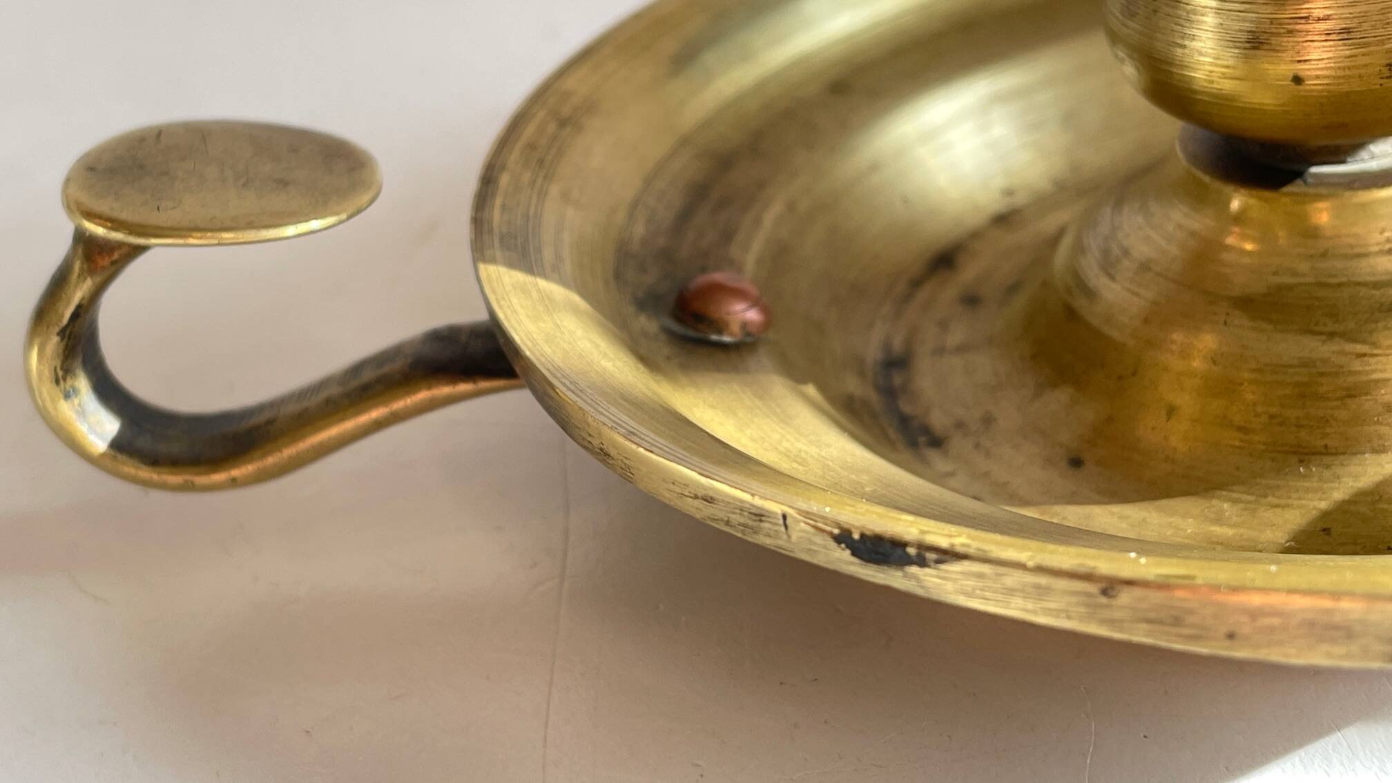 Antique solid bronze hand candlestick