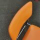 Tubmenager orange vintage chairs