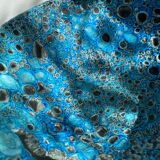 Eruptive ceramic dish from the 60s