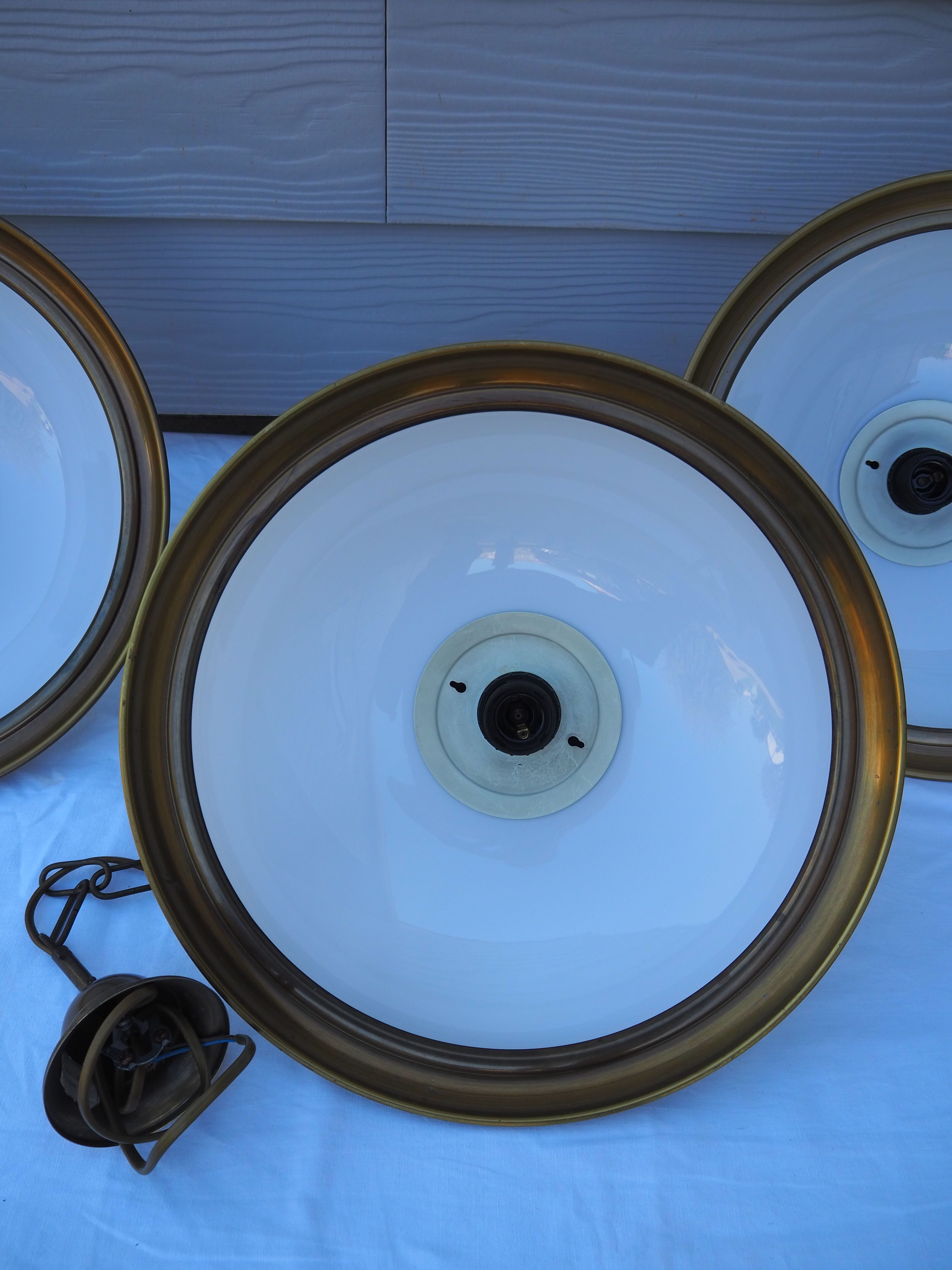 Suspension in white opaline, its edge in aged brass