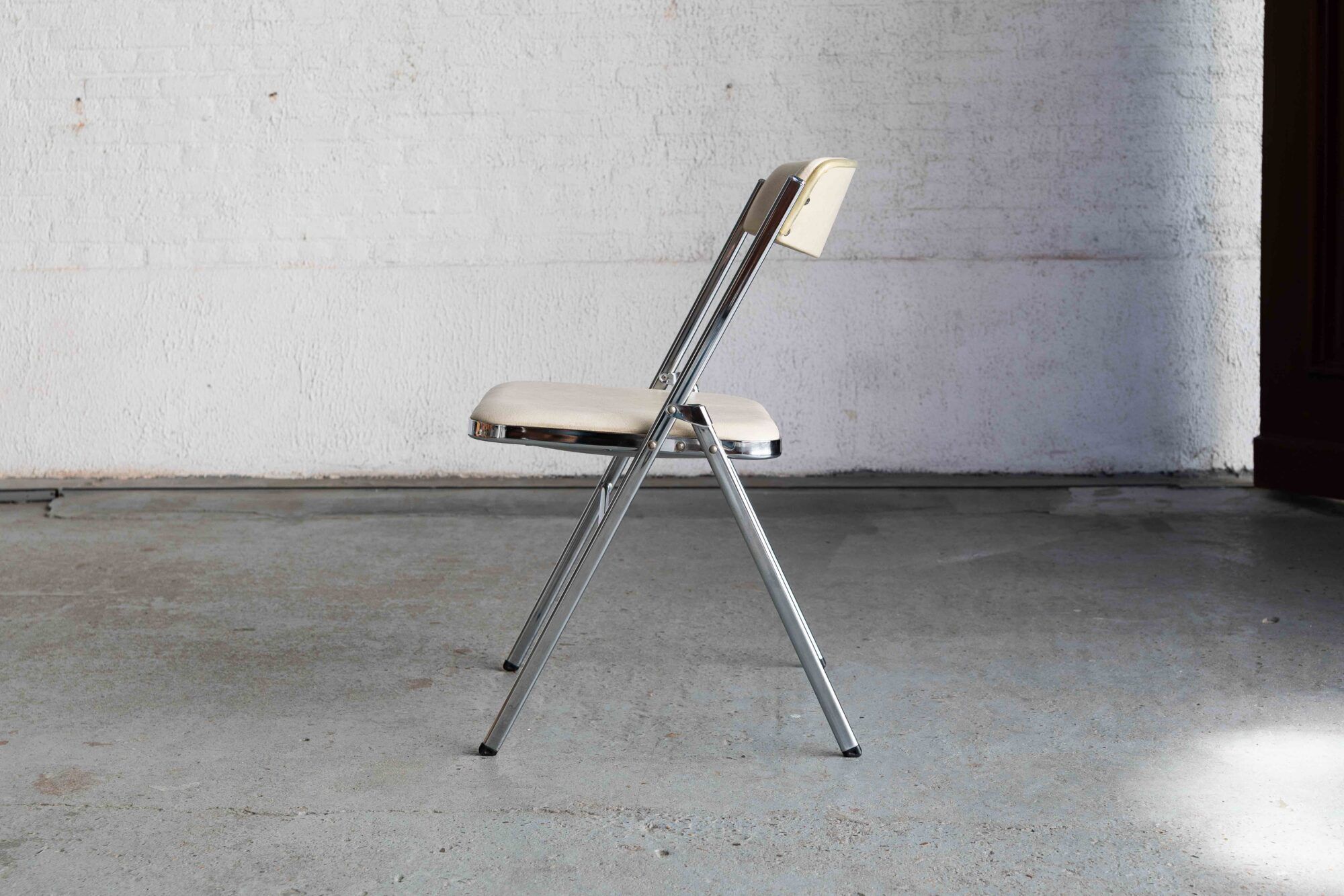 Set of 4 'Plia' dining chairs by Giancarlo Piretti