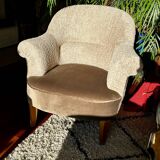 Fully restored beige and graphic armchair.