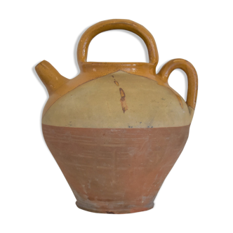 Ancient enamelled ceramic jug